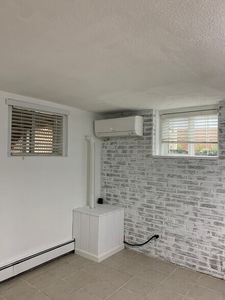 Living room with mini split AC - 36 Summer St