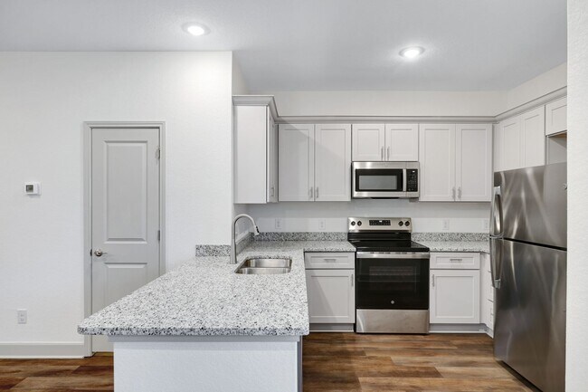 Building Photo - Beautifully Designed Townhome with Upscale Finishes