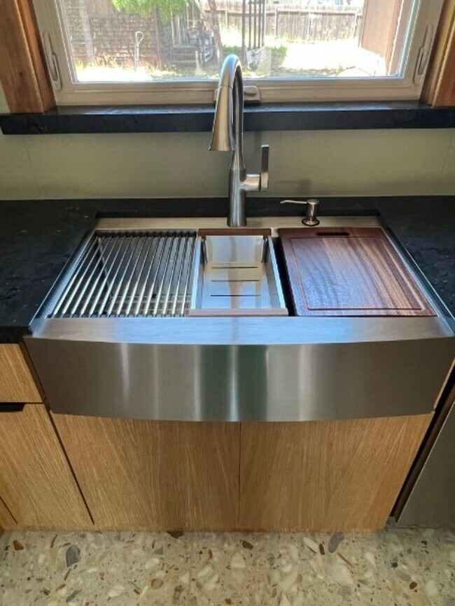 Building Photo - Artisan-Built Custom Cottage Retreat | Private Yard, Garage & EV Charging Ready