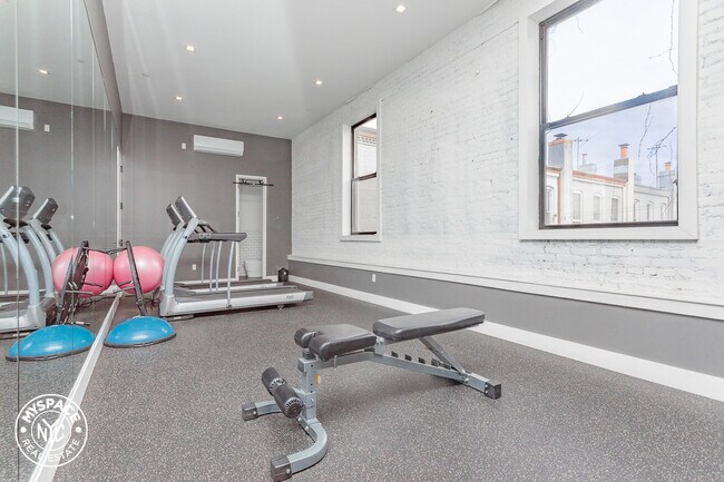 Building Photo - 60-15 Myrtle Ave