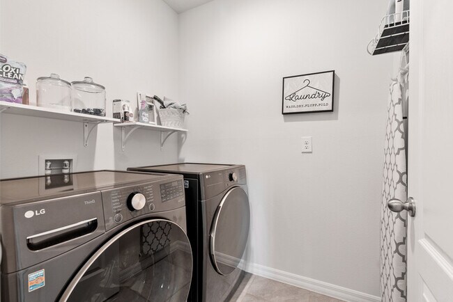 Building Photo - 4BR Under $2,300/mo | Tesla Charger | 15 Min to Lake Nona