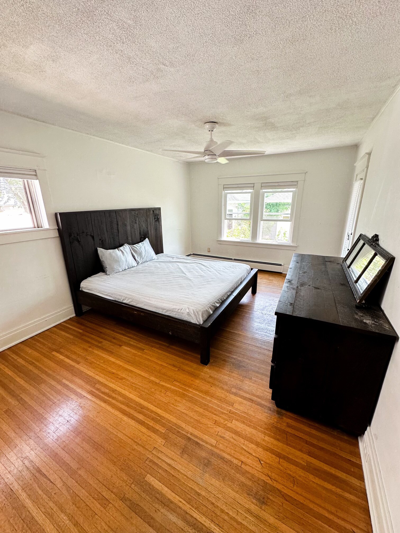 Primary bedroom with exit door to patio - 299 Wellington Rd