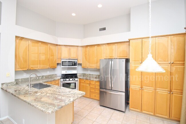 Building Photo - 5997 W Aurora Dr