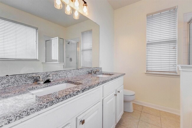 Building Photo - 7434 Jacobs Well Dr