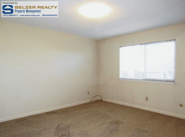 Building Photo - Roomy 2 bd. downstairs apt. near school, p...