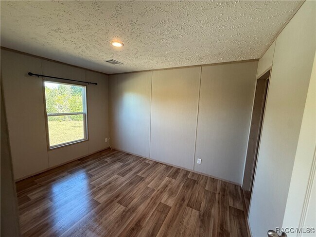 Building Photo - 5469 W Grovepark Rd