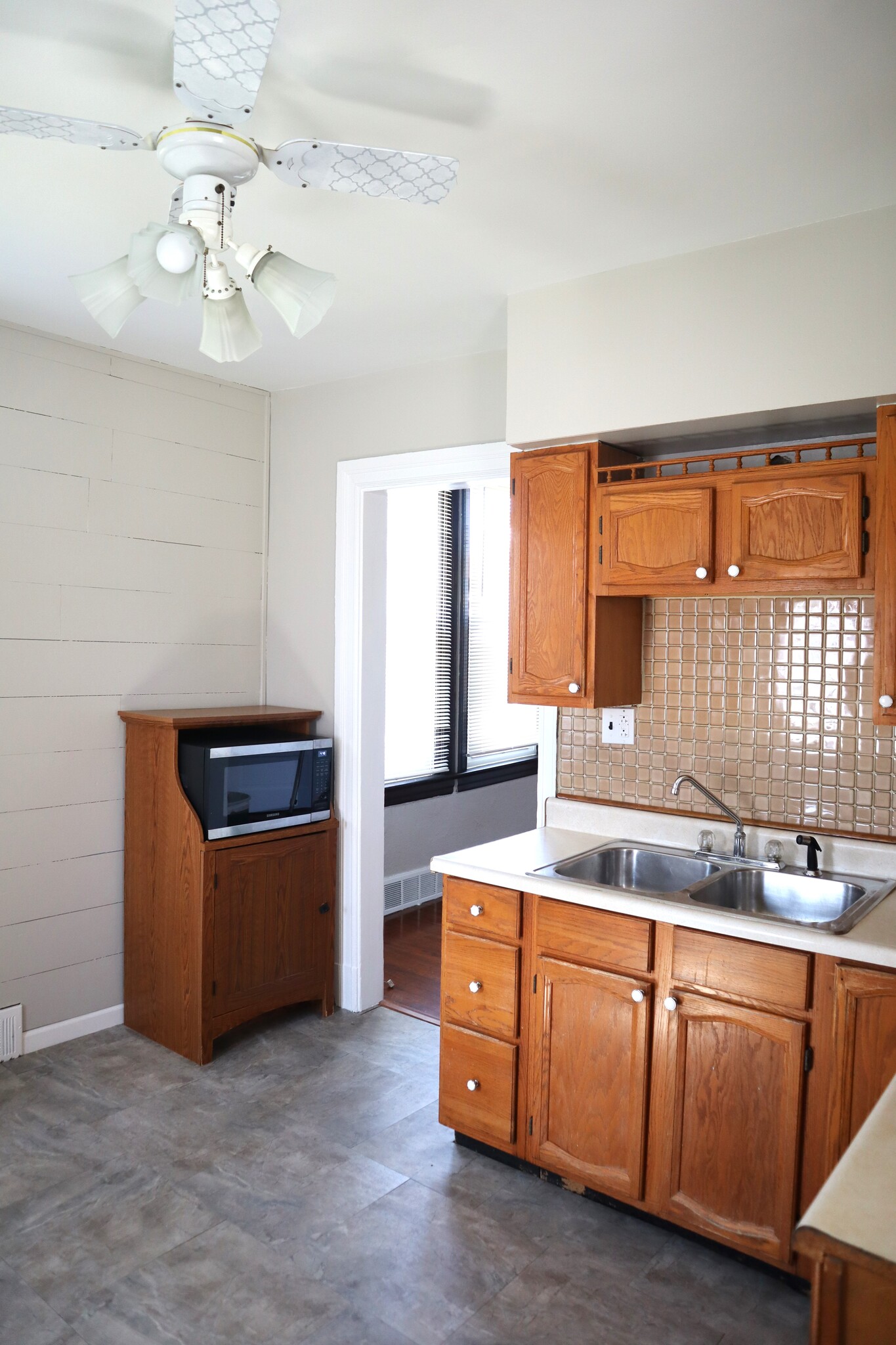 The kitchen connects to the dining room - 715 Clinton Pl