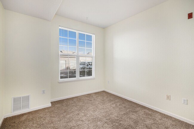 Building Photo - Bright 2-Bedroom Condo with Private Patio & Resort-Style Amenities!