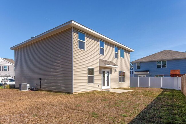 Building Photo - 6473 Flora Court