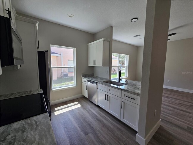 Building Photo - 7437 Mead Dr