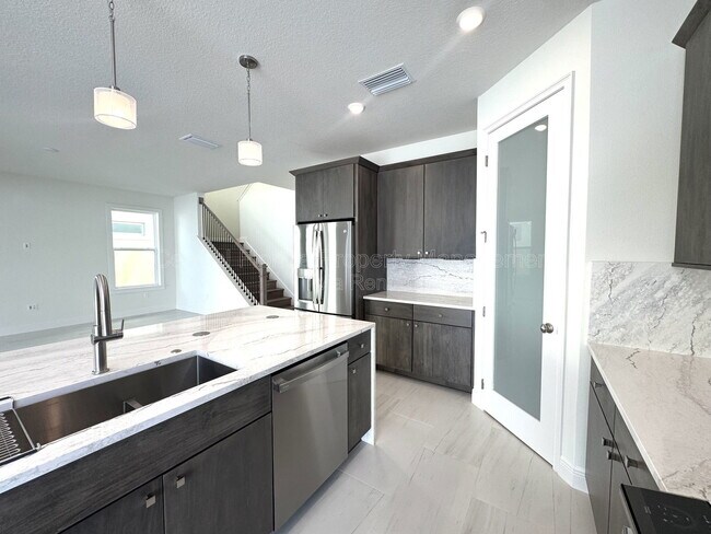 Building Photo - 9819 Gobat Aly