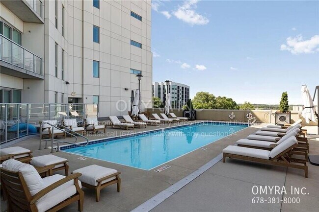 Building Photo - Stunning 3-Bedroom Midtown Condo with City Views!