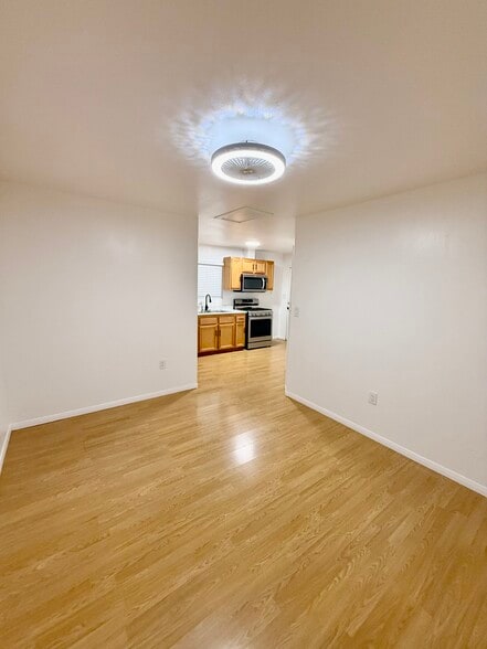 Living room, looking out - 9845 Rosecrans Ave