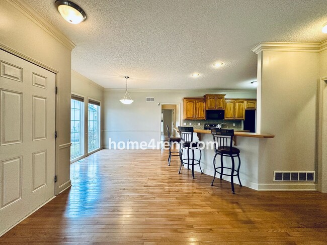 Building Photo - Maintenance Free! Main level Master, Finished Basement and Wood Floors in the Kitchen! *Brand New...