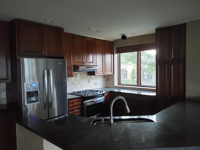 Building Photo - Large two bedroom top floor Condo....over looking lake Harriet.