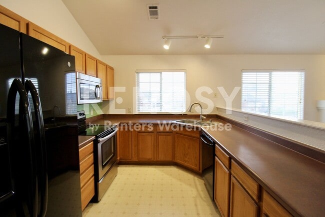 Building Photo - 3242 E 103rd Dr