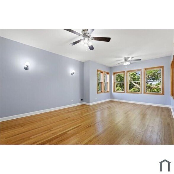 Building Photo - 5639 N Artesian Ave