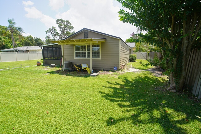 Fenced Back Yard with Lake View - 709 Meredith St