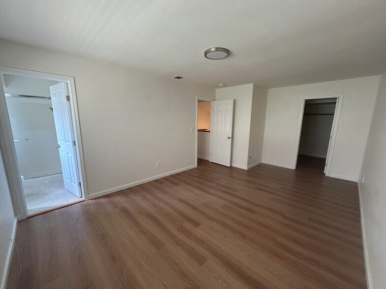 Master bedroom with walk in closet - 1312 Shaddick Dr