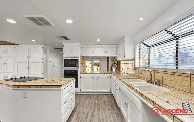 Building Photo - Beautiful 3 Bed, 2 Bath Home with Pool, Solar & Cozy Fireplace