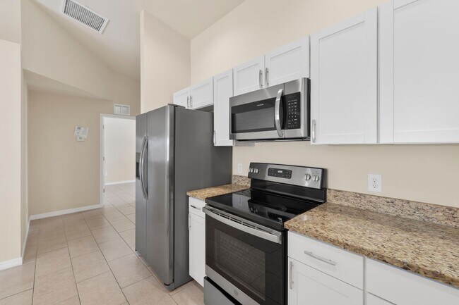 Building Photo - LB - Newly Constructed 3 bed 2 bath duplex with garage.