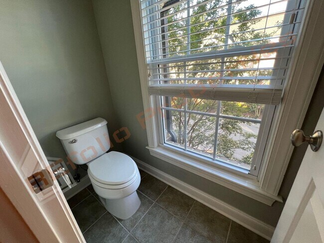 Building Photo - Elegant 3 Story 3 Bedroom Formal Model Tow...