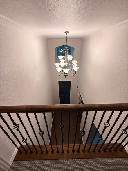 Upper floor looking down on foyer - 2489 Yuma Dr