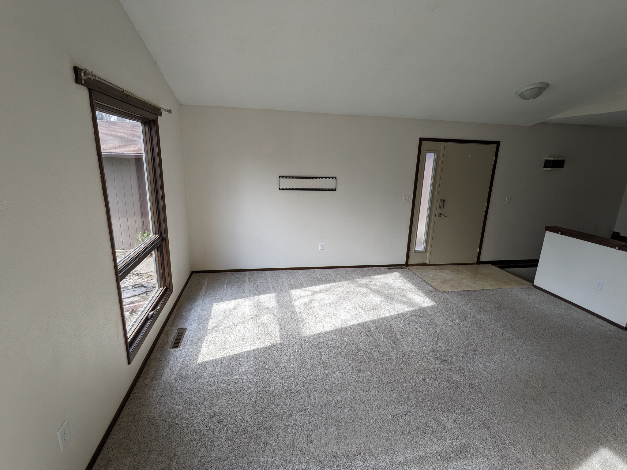 Living Room (2) (Large Window, TV Wall Mount, Front Door) - 1028 Mesa Verde Pl