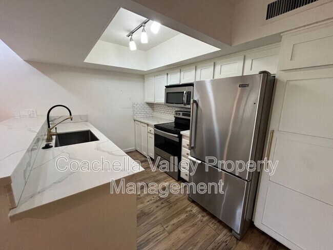 Building Photo - 1655 E Palm Canyon Dr