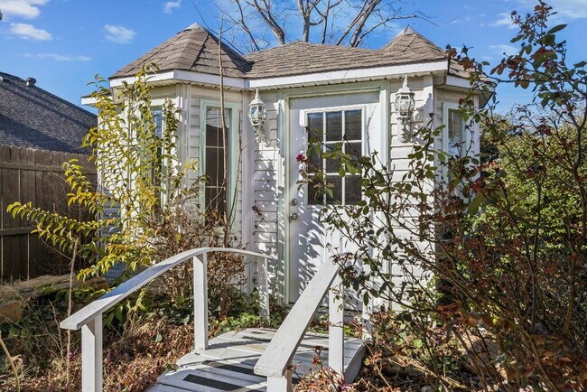Building Photo - "Coming Soon! Spacious 4-Bedroom, 2.5-Bath Living Meets Storybook Backyard Charm!"