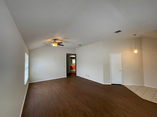 Building Photo - SPACIOUS HOME - NEW FLOORING! - 2 LIVING A...