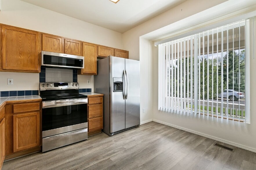 Building Photo - Spacious 4-Bedroom Home with Finished Base...
