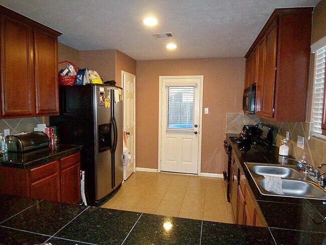 Building Photo - 10838 Windfern Lakes St