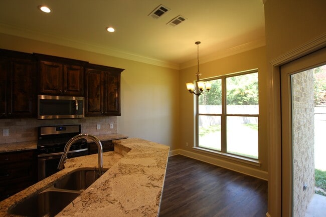 Building Photo - Beautiful 4 Bedroom Home Coming Soon in Bu...