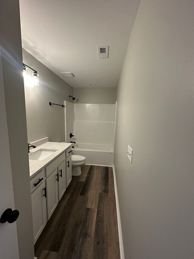 Building Photo - 7057-7059 Caravan Drive