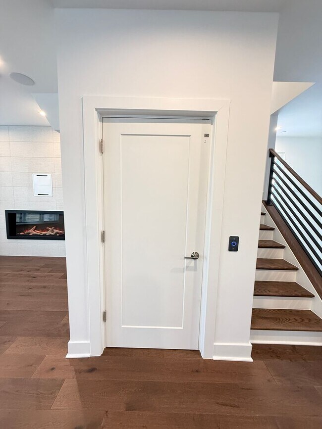 Building Photo - Brand new 4 level, 4 Bedroom Townhome with Elevator!