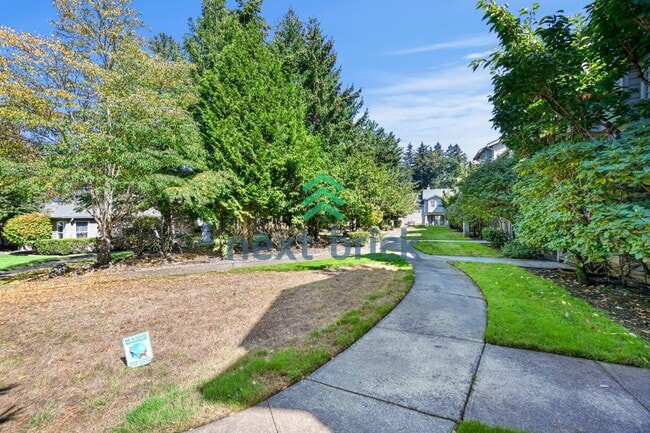 Building Photo - Spacious 3-Level Condo with 2-Car Garage, Mt. Rainier Views & Turnkey Comfort in Bonney Lake