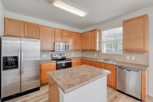 Building Photo - 9104 China Rose Dr