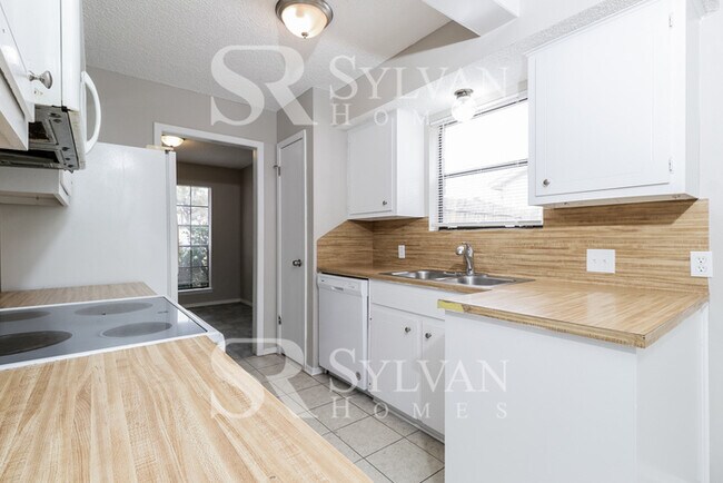 Building Photo - Turn the key. Enter. Smile. Repeat every day!