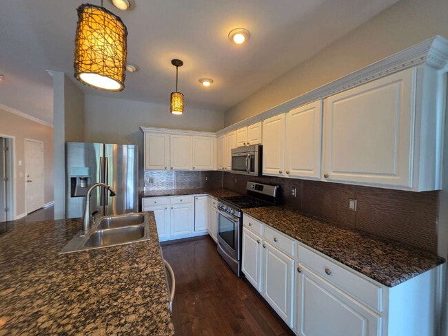 Building Photo - Lakefront 3BR/3BA with Covered Deck, Garage & Community Pool