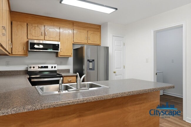 Building Photo - NEWLY RENOVATED 4 BEDROOM ASHBROOK HOME
