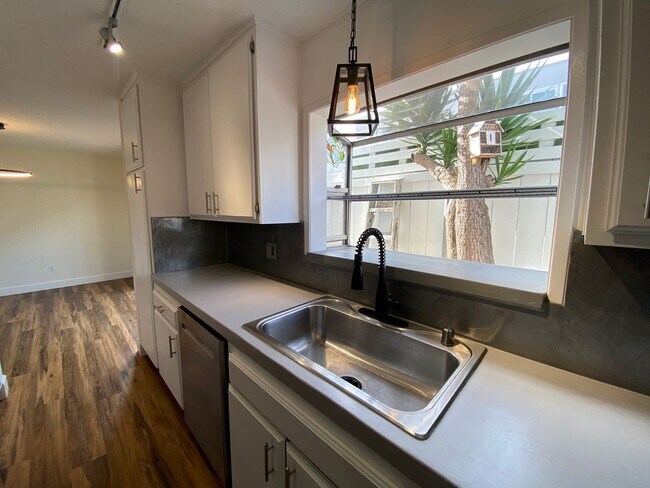 Building Photo - TWO PARKING SPACES INCLUDED! In Unit Washer & Dryer! Large Private Patio for Bikes, Boards and Bb...