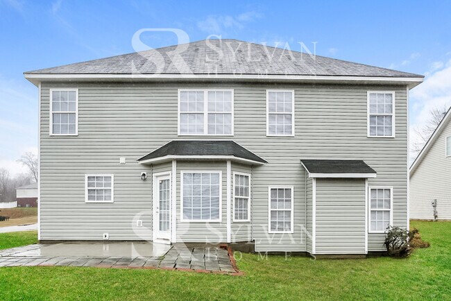 Building Photo - Stately 4 BR, 2.5 BA home