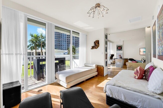 Building Photo - 10275 Collins Ave