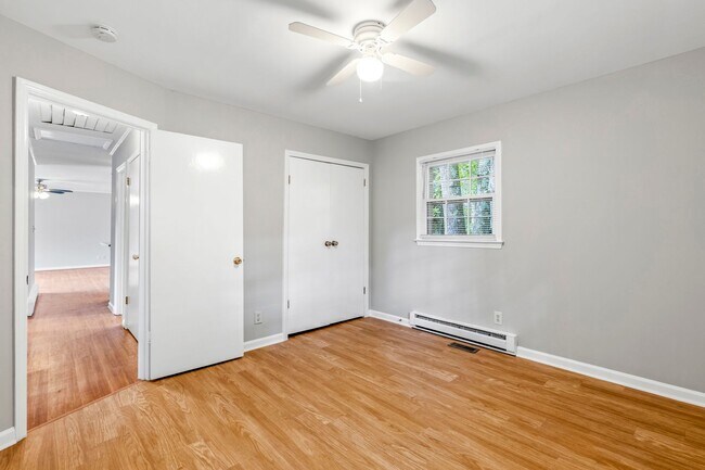 Building Photo - Updated Home, Stainless Steel Appliances, Wood Like Flooring, Deck, Garage!