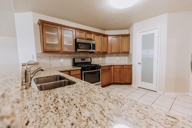 Building Photo - 11818 Canyon Falls Dr