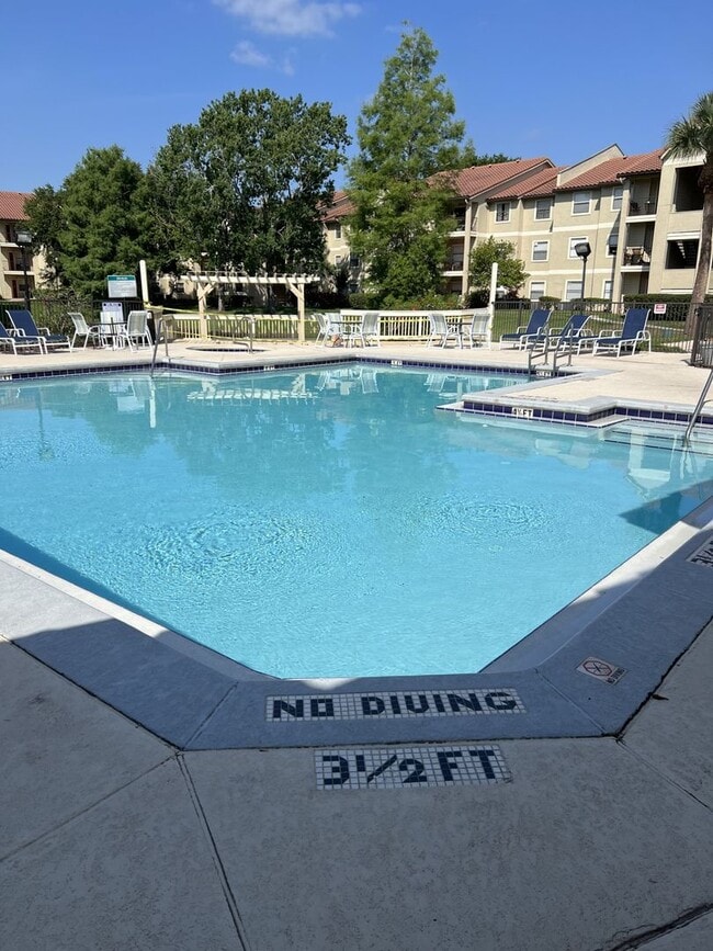 Building Photo - Blossom Park Villas Condominiums