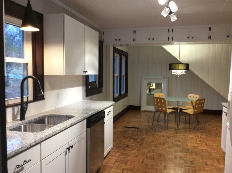 Spacious granite eat-in Kitchen with space for large china hutch or buffet and other pieces. - 361 W Wilson Ave