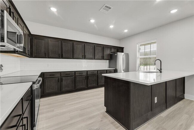 Building Photo - Brand New Barracks Townhome for August 202...