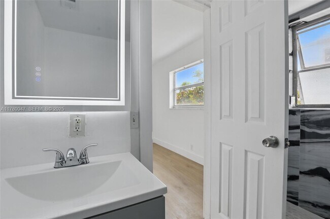 Building Photo - 8540 N Sherman Cir